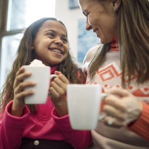 Mom & Daughter with hot cocoa