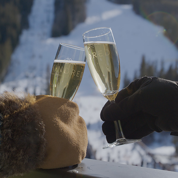 Kindred champagne glasses cheersing