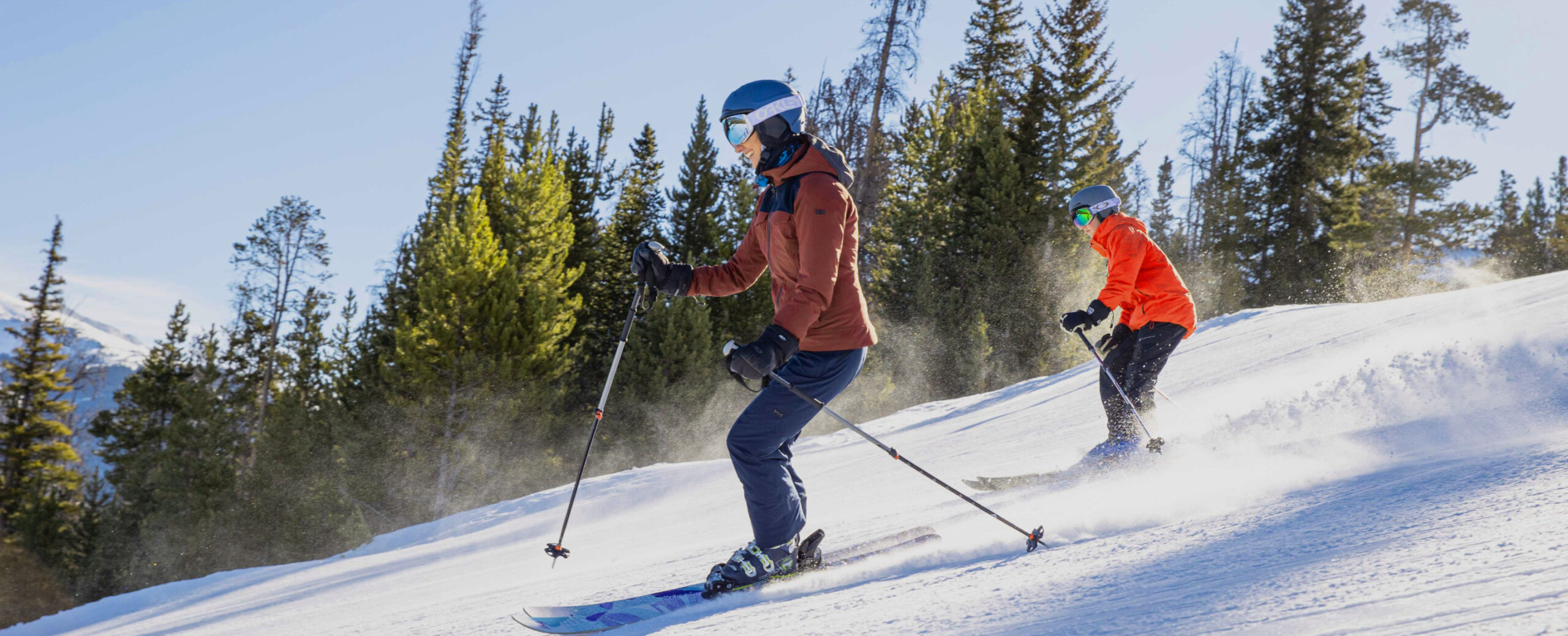 Couple Skiing down the hill Kindred Resort Keystone